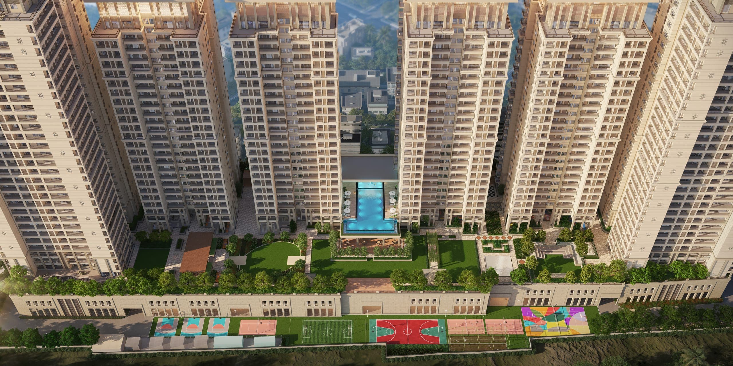 Aerial view of the Paris City township with the central landscaped spine and pool between six towers